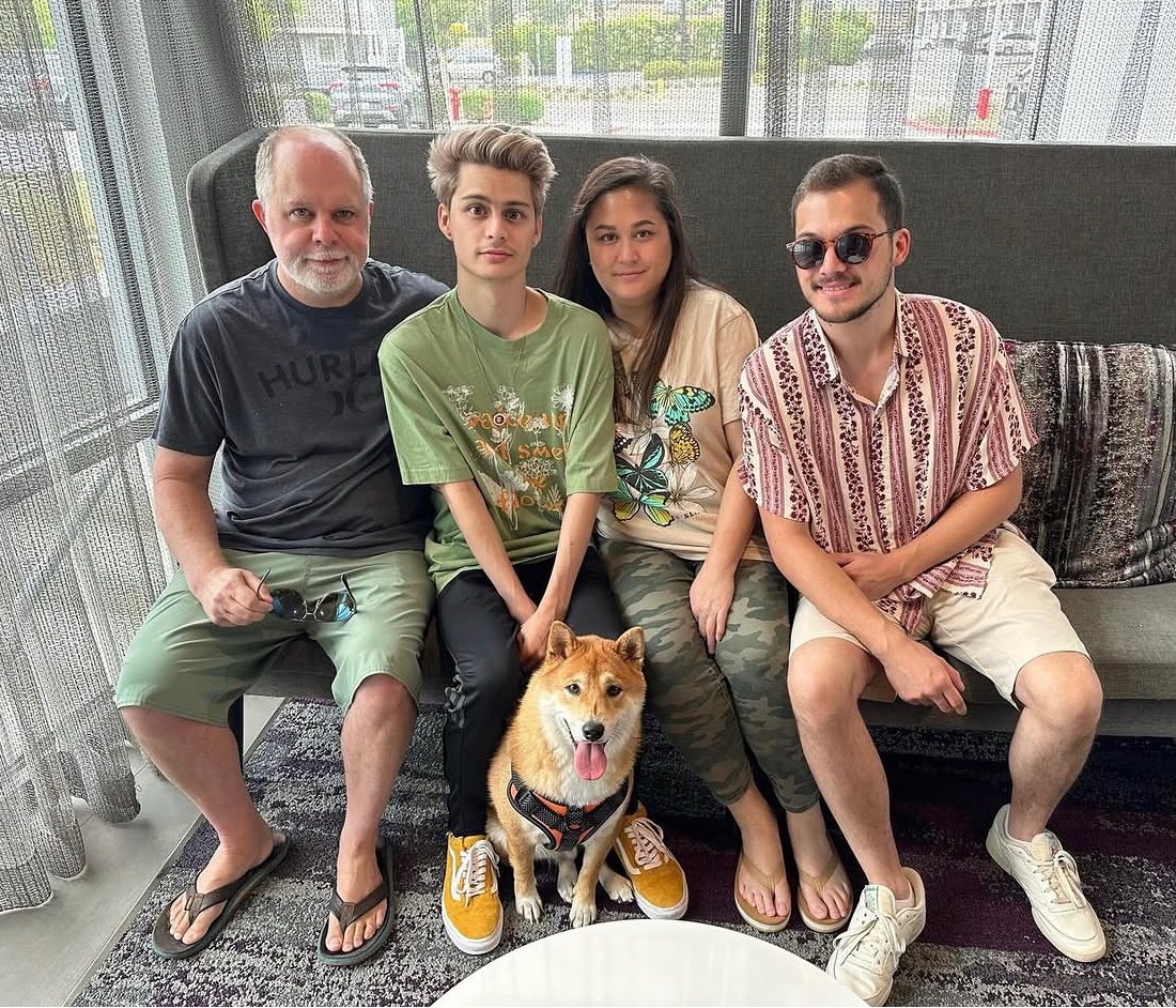 Mhy Fox with her family and their Shiba Inu